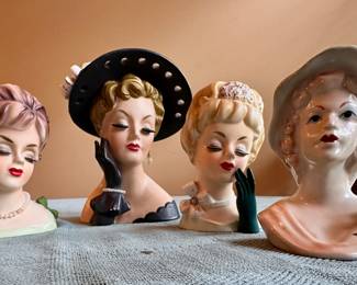 Glamorous vintage mid-century lady head vases.
