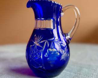 Vintage cobalt blue cut clear pinwheel flower creamer pitcher.