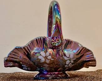 Fenton handled basket in amethyst carnival glass, signed by Bill Fenton.