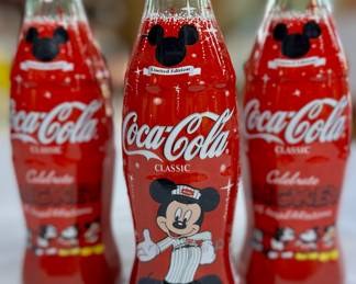 Limited edition bottles of Coca-Cola with Disney labels.