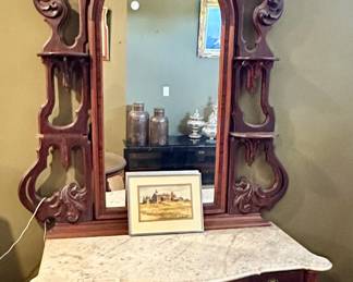 American Rococo revival carved mahogany bow front marble top dresser, ca. 1870.
