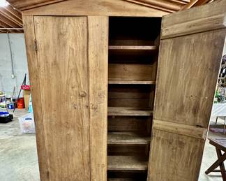 Antique gabled cupboard. Very solid and functional.