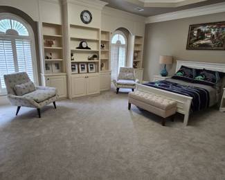 Another view of bedroom. Pair of chairs.