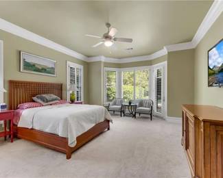 Queen Mission style bed, 2 red bedside tables (30”hx24”w), Pair of accent chairs and side table.