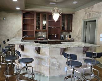 7 Arhaus industrial barstools.