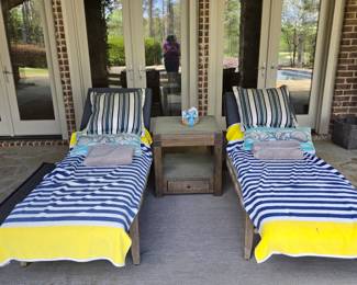 Frontgate woven chaises with Navy cushions. Cusions in excellent condition. Protecting from pollen with beach towels.