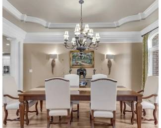 Ethan Allen 8 foot long dining table with one leaf and 6 Frontgate upholstered chairs.