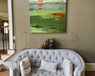 Upholstered loveseat, 70” wide.