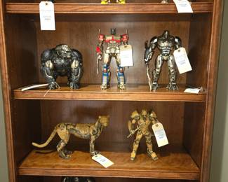 Hasbro Transformers. Licensed Limited Edition Bronze Statues. (From Top L to R) 1: Airazor, Bumblebee, Mirage 2: Optimus Primal Beast Mode, Optimus Prime, Optimus Primal 3: Cheetor Beast Mode, Cheetor 4:Rhinox Warrior, Rhinox Beast Mode