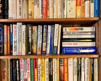 SOME of the autographed books from the radio interviews John Moore conducted with the authors
