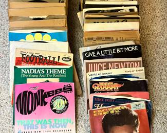 So many 45’s. Many of them are promotional copies that were distributed to the radio station in which the previous owner of this house was employed.