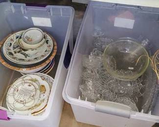 Large bins full of glassware