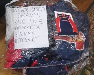 Never used Braves king size comforter three Shams and bed skirt