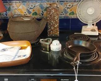 Cast iron frying pans and early cast iron kettle