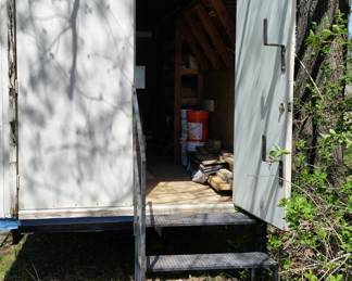 These are the steps for storage section. Both doors can be opened with the steps installed.