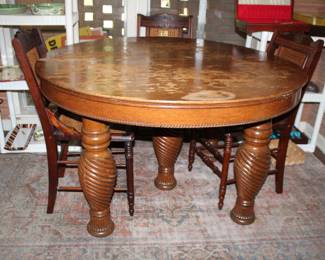 solid wood dining table plus four 12" leaves
