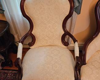 White Upholstered Chair With Wooden Flower Details