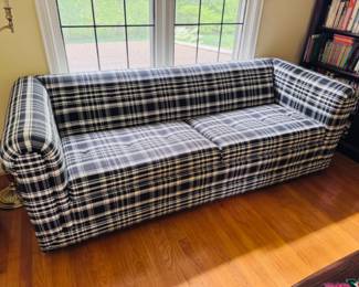 Classic black and white plaid pattern sleeper sofa, in excellent condition