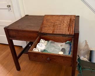 Mission desk with lid of drawer opens.