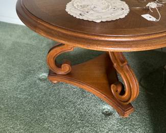 This is a lovely round three legged end table excellent condition!