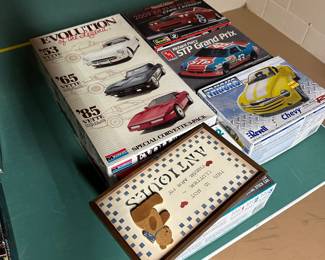 In the basement, there’s a massive ping-pong table (that stays with the house) but on it are fantastic, vintage airplane and car models mint in their original boxes!
