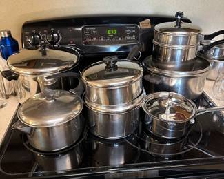 Here are lots of vintage pots and pans many of the pieces are Revere Ware!
