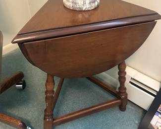 This is a STUNNING Tri-Quarter drop leaf table! Refinished and restored by HENSLERS in Saginaw