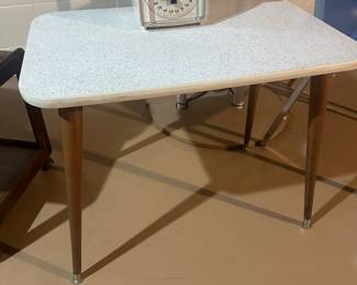 This is a for Mika top mid-century modern coffee table