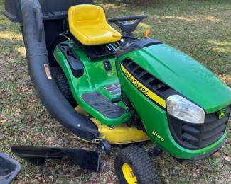 John Deere E100 series 42” deck riding mower with grass catcher.
130 hours pristine condition.