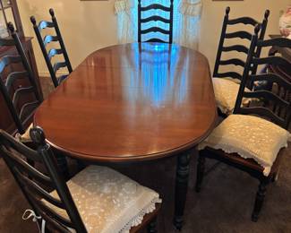 American Drew dinning table, leaf and 6 chairs. $400.00
