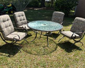 5 piece Patio Set metal table & chairs. Great glass top design. $150.00