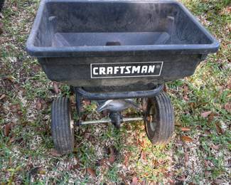 Craftsman spreader with tractor attachment. $75.00