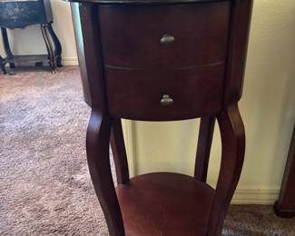 Oval Box Cherry End Table: 16”w 14”d 30”t. $ 75.00