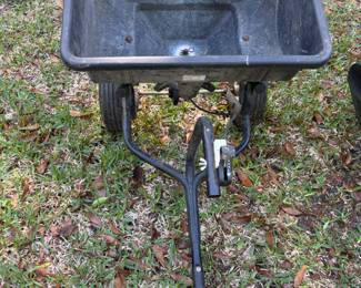 Craftsman spreader with tractor attachment. $75.00