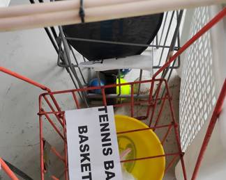Tennis ball pickup baskets plus misc sports euipment.