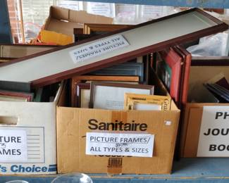 All sorts and sizes of picture frames plus photo journal's
