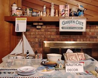 Light house and Nautical themed items. Also have light house fabric and matching seat cushions.