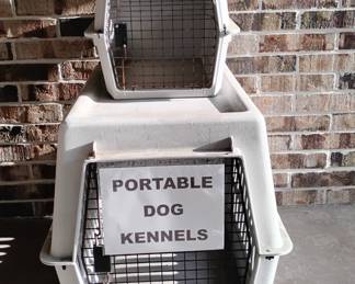 Large and smaller portable dog kennels