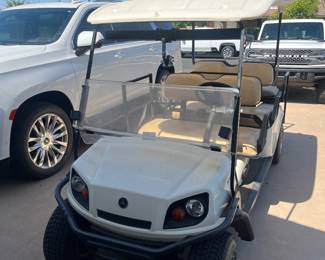 Golf cart sits 6