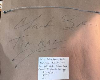 Detail of signature and explanation by artist