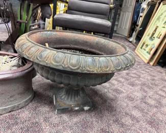 One of Two Cast Iron Urns