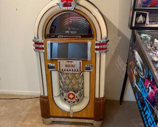 Bubbler style jukebox playing CDs needs tender, loving care, but isn’t very good condition