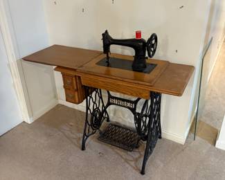 Antique Singer sewing machine with case