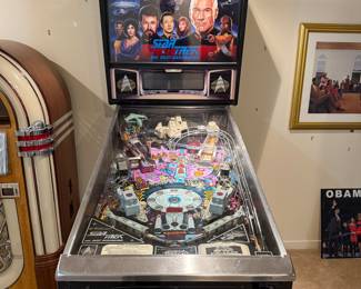 Star Trek, the next generation pinball machine needs tender, loving care, but it’s in very good condition and the case is excellent