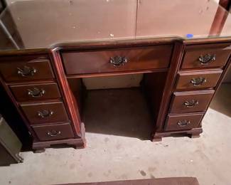 Secretary desk with glass top.