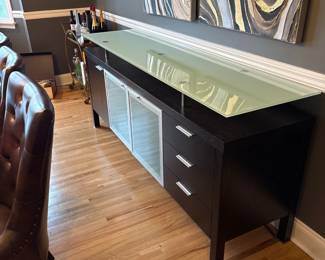 wooden buffet table with elevated glass top