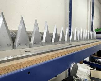 faux highway spikes made from acrylic painted as metal very real looking