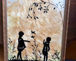Reverse Painting Children Playing Silhouette with Milkweed Background
