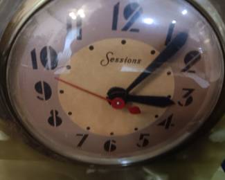 Lot #8: Vintage General Electric Sessions clock with horse from the 1940's with gold-colored horse. The Streamline Moderne design clock works! Sits on a green onyx-like base. 12" long x 3" wide x 7" tall