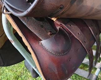 World War II German Nazi calvary officer's saddle with the original wooden stirrups and boot guard, very good condition